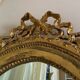 Antique oval mirror with gold leaf – Pediment with bow & floral motifs style