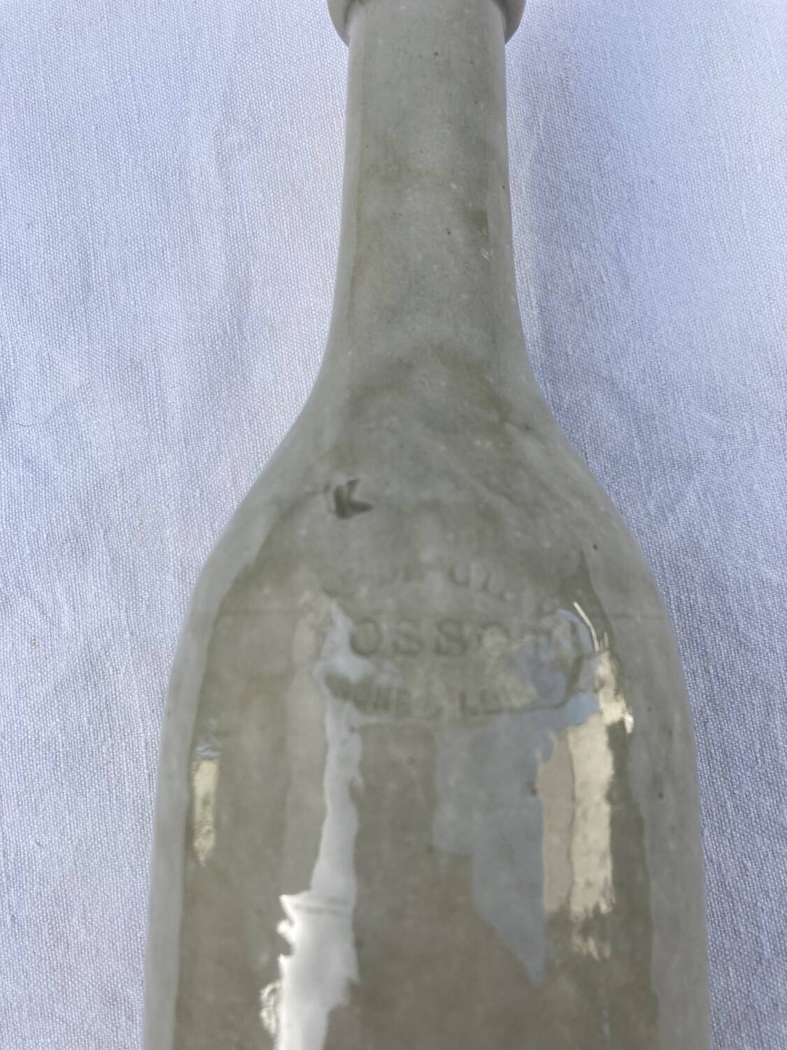 Pair of old Bossot stoneware bottles