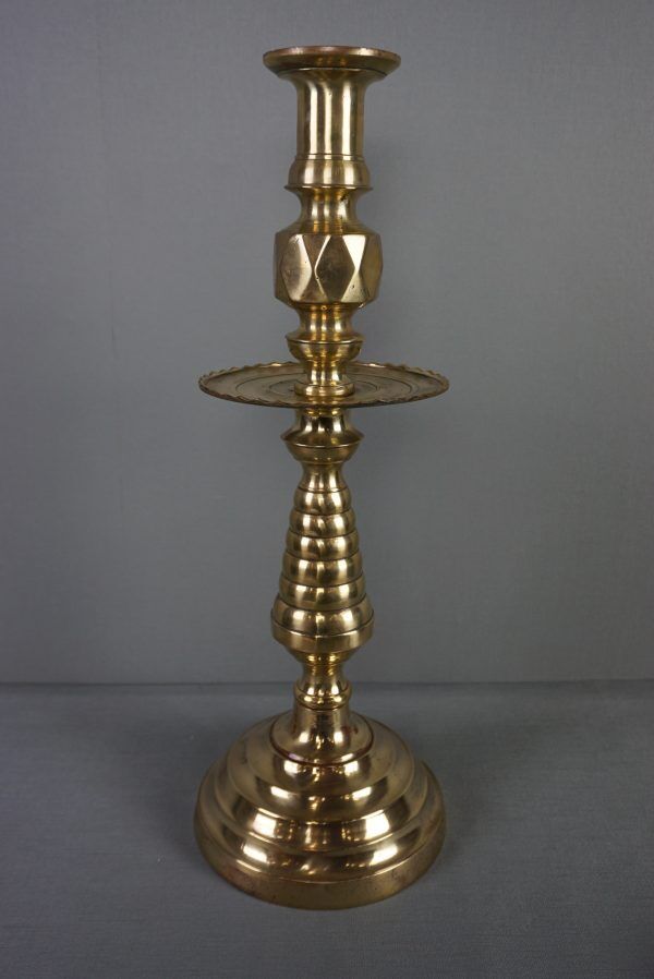 Old yellow copper neck candle holder