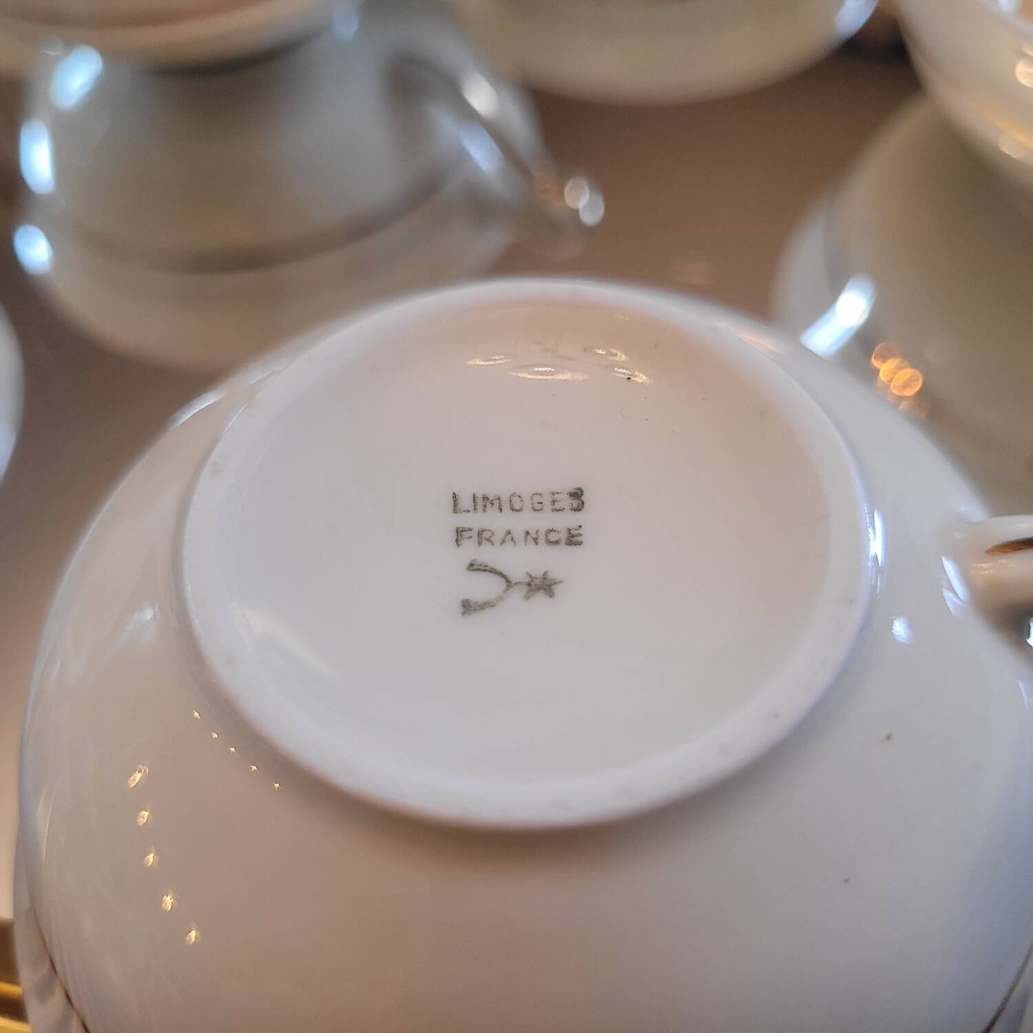 8 porcelain cups from Limoges – gold trim – 1950s