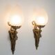 Pair of torch wall lights in Louis XVI style in 19th-century bronze.