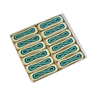 Set de douze porte-couteaux en céramique turquoise