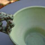 Antique cup with handles