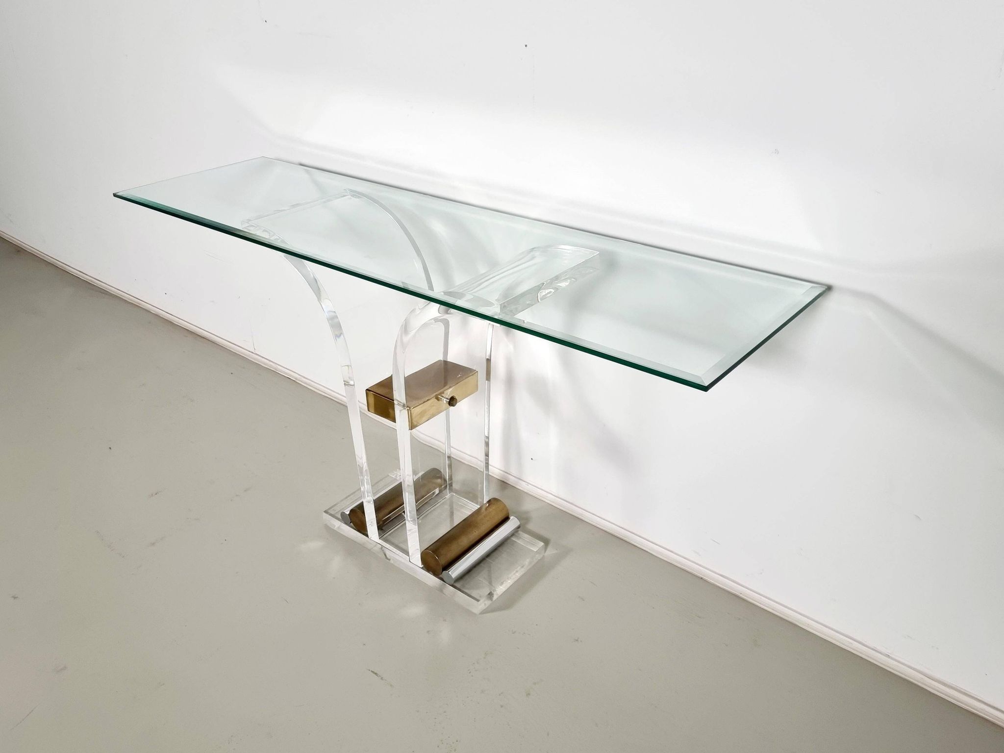 Console table by Charles Hollis Jones in lucite, brass, and glass, 1970.