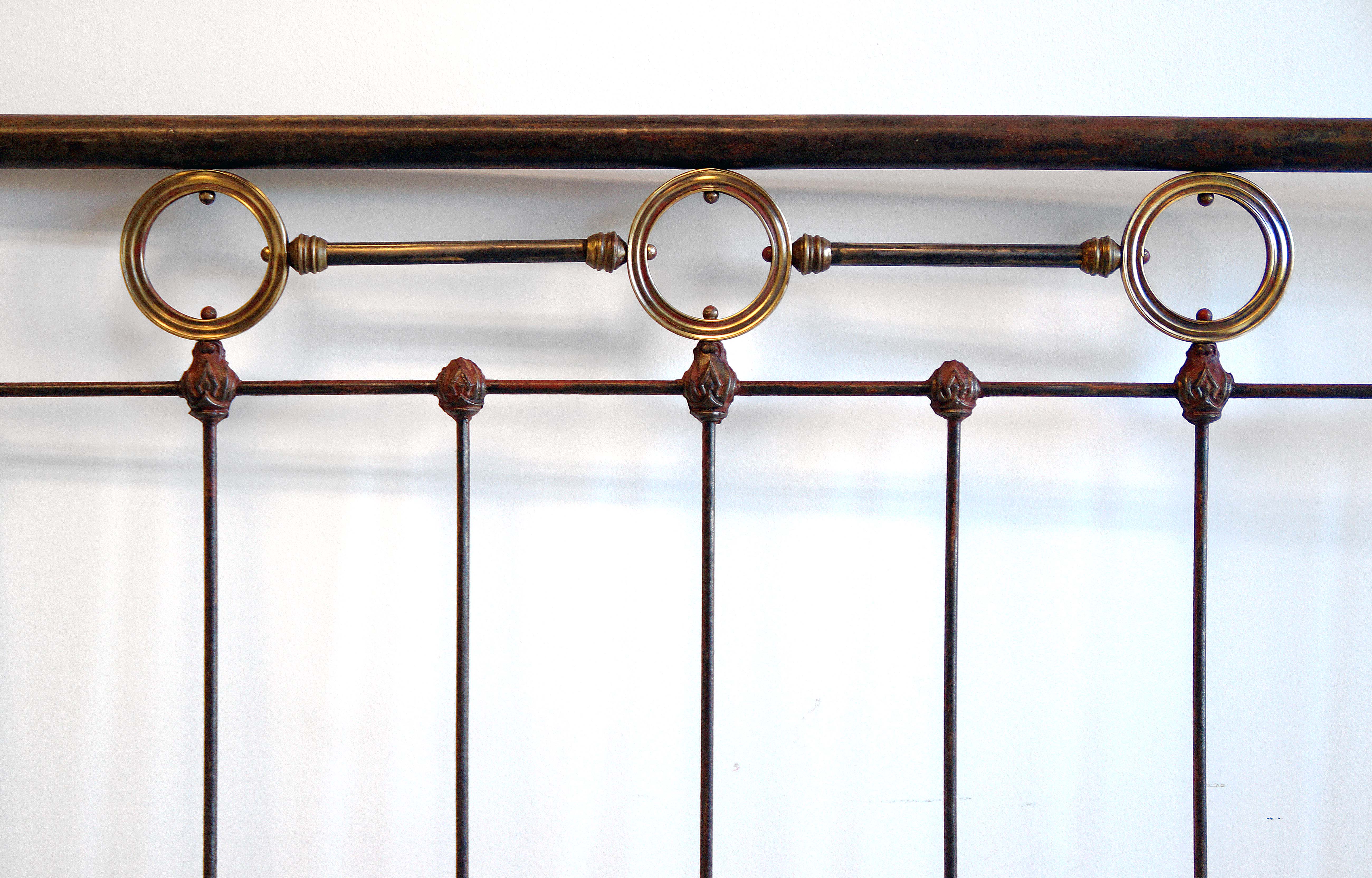 Iron and brass headboard