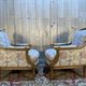 Pair of armchairs / bergères and footstool in Louis XVI style