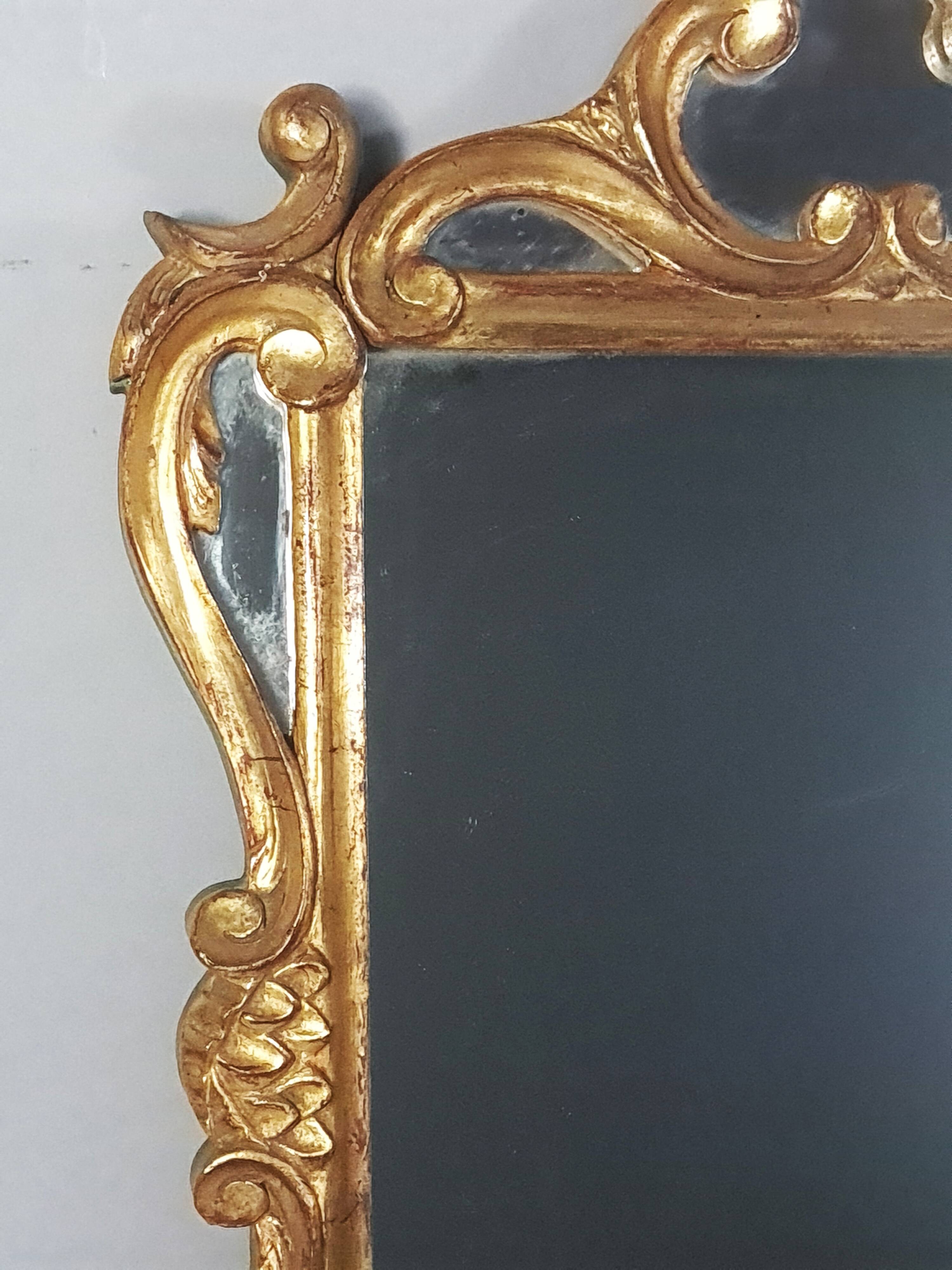 Antique mirror with carved wooden frame and original gilding, 53x37 cm, SD207.