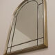 Pair of bevelled mirrors, brass edging frame in brushed wood years Italy 70's