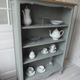 Louis XV style bookcase, green gray with 3 adjustable shelves, wooden tray.