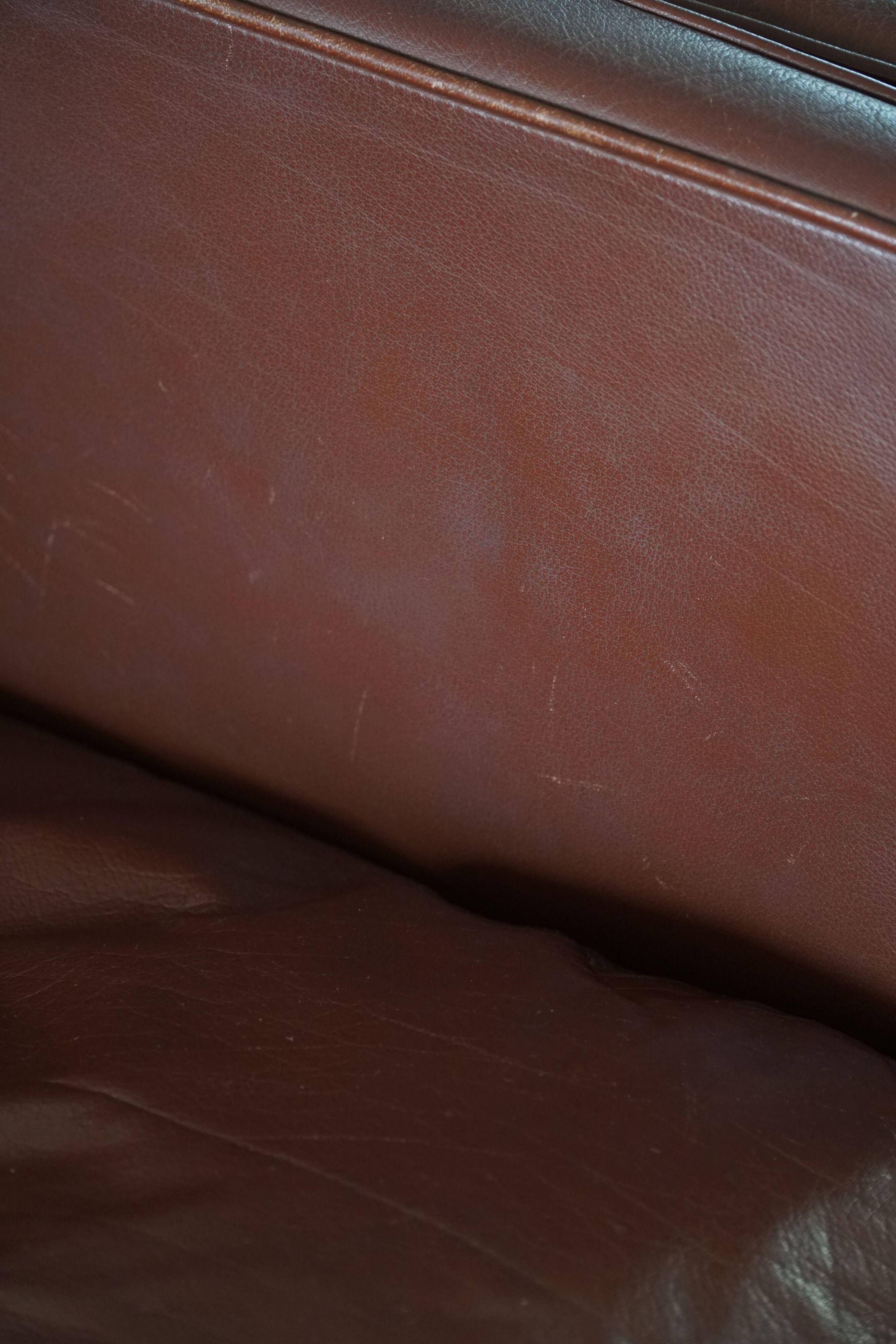 Stouby Møbelfabrik, two-seater sofa in mid-century style in brown leather, 1970s.