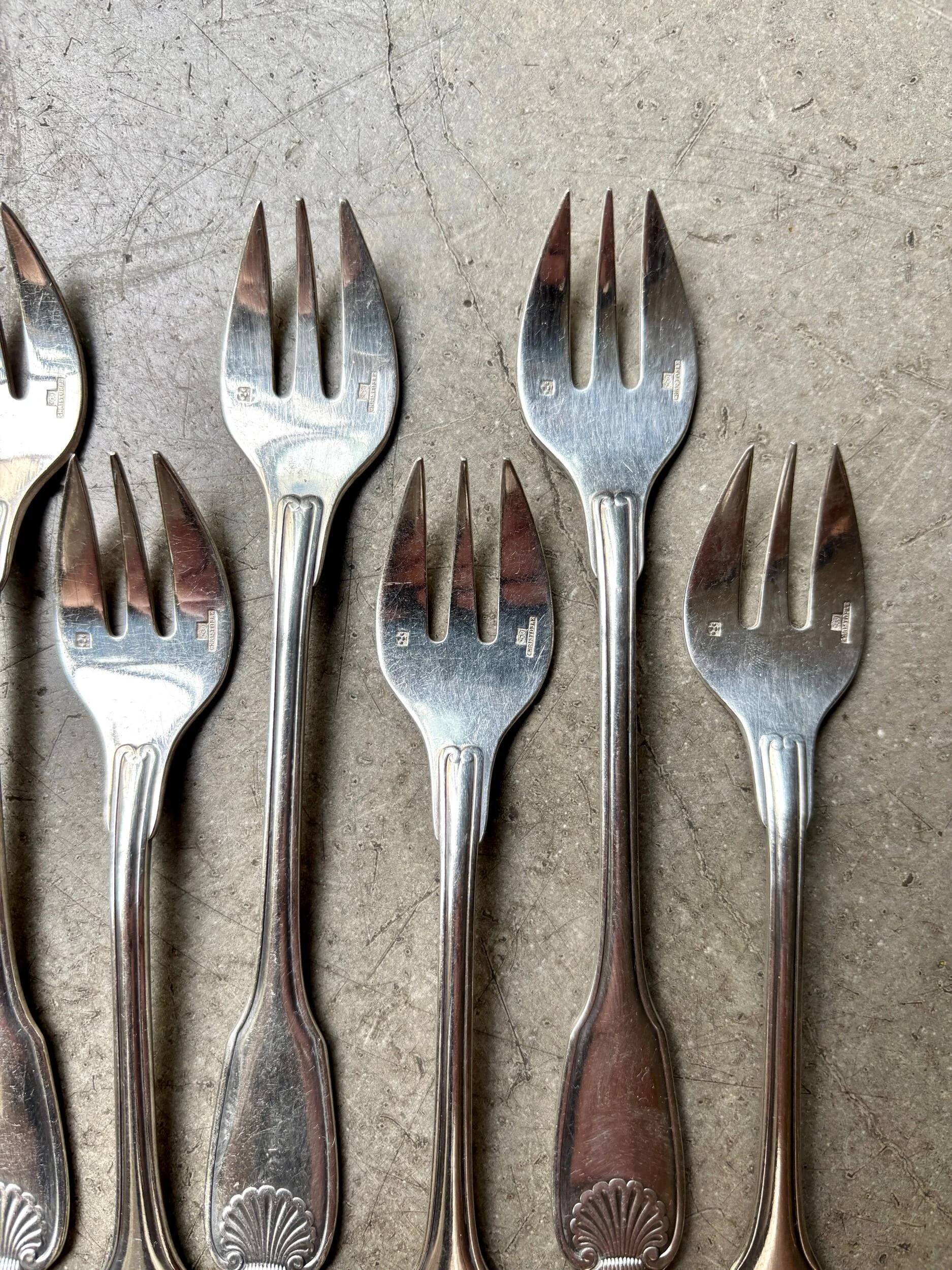 6 Christofle silver-plated oyster forks, shell design.