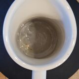 Cream glazed ceramic pitcher