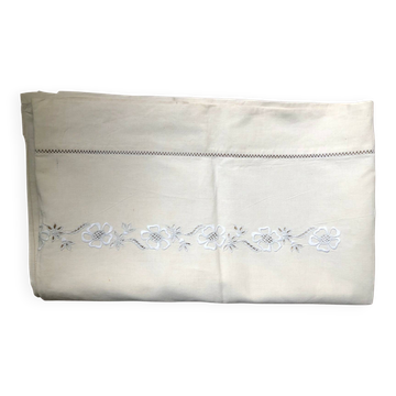 Antique embroidered linen with a floral motif