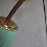 Illuminated cocktail cabinet in brown walnut and brass, multicoloured lampshades, 1950s.