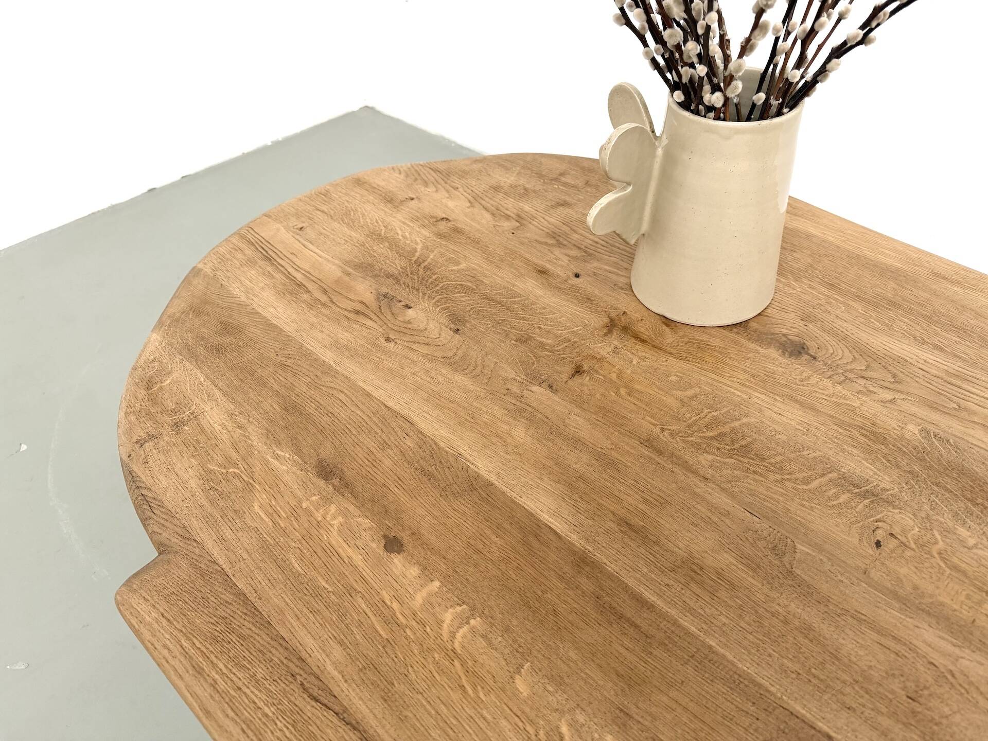 XXL oval coffee table in solid oak, cylindrical base, 1950s.