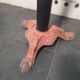 Bistro standing table with marble top and cast iron base.