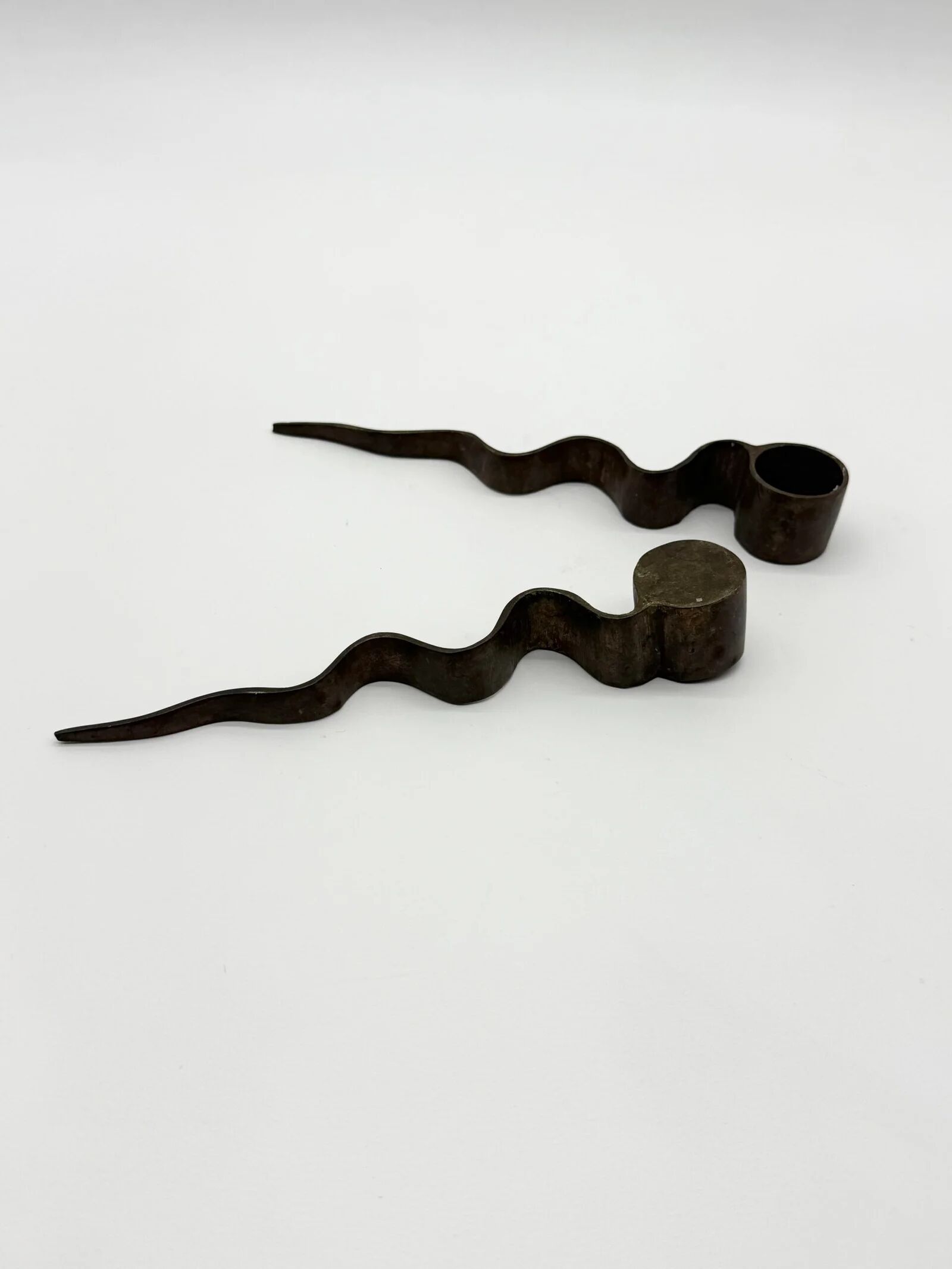 Pair of "Serpentine" candlesticks, modernist, 1970s