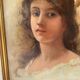 Portrait of a young woman with a laurel crown.