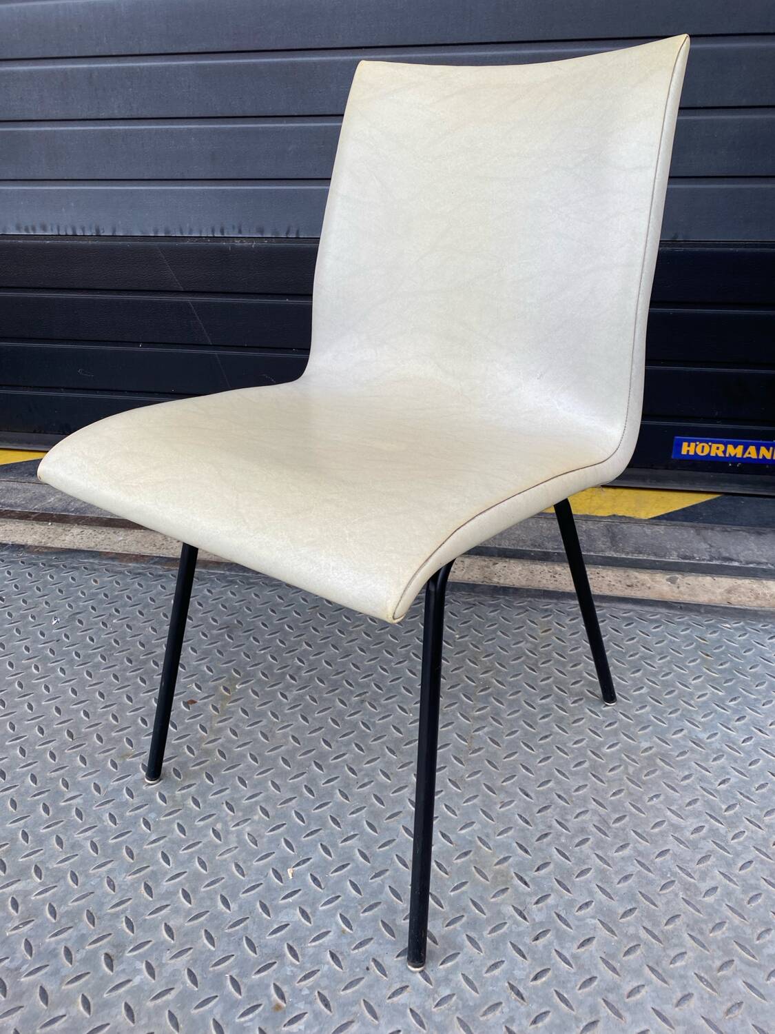 Office chair by Pierre Paulin for TV unit