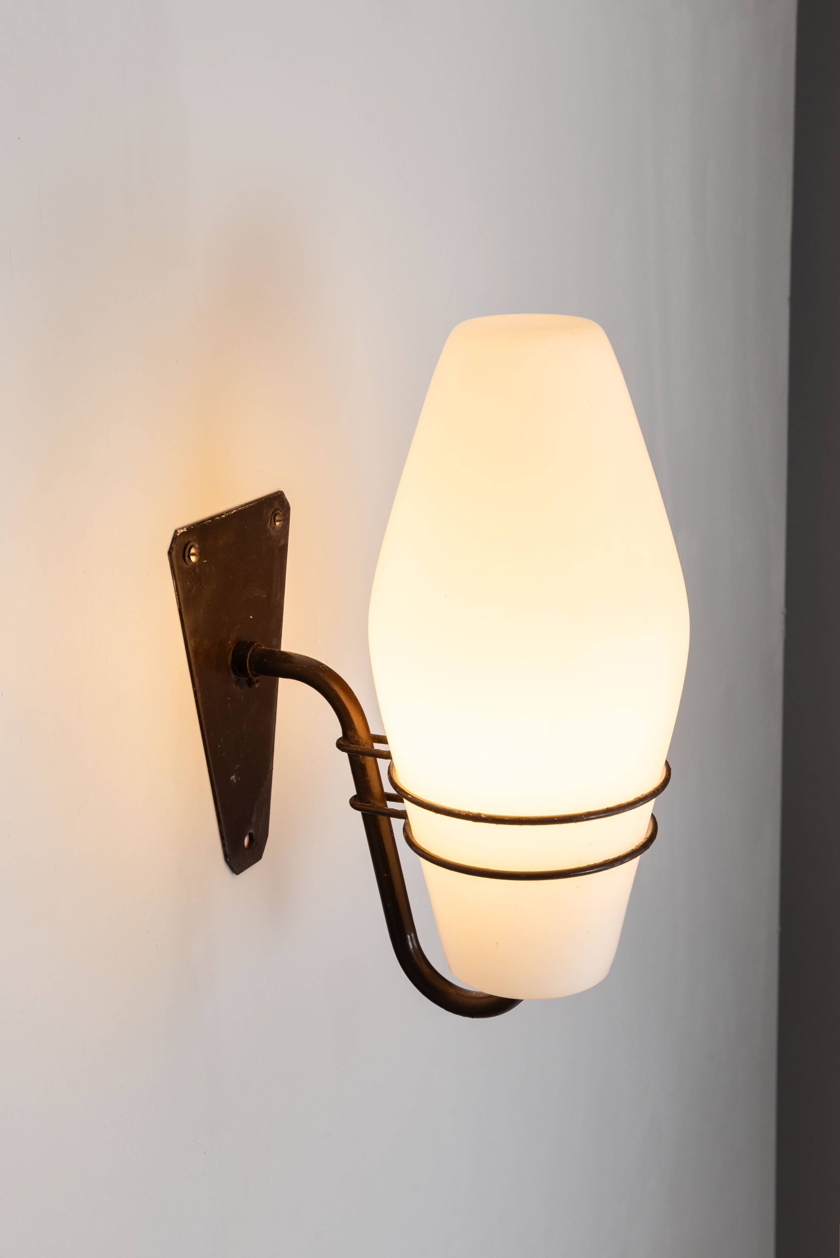 Large outdoor lamp made from metal and opal glass