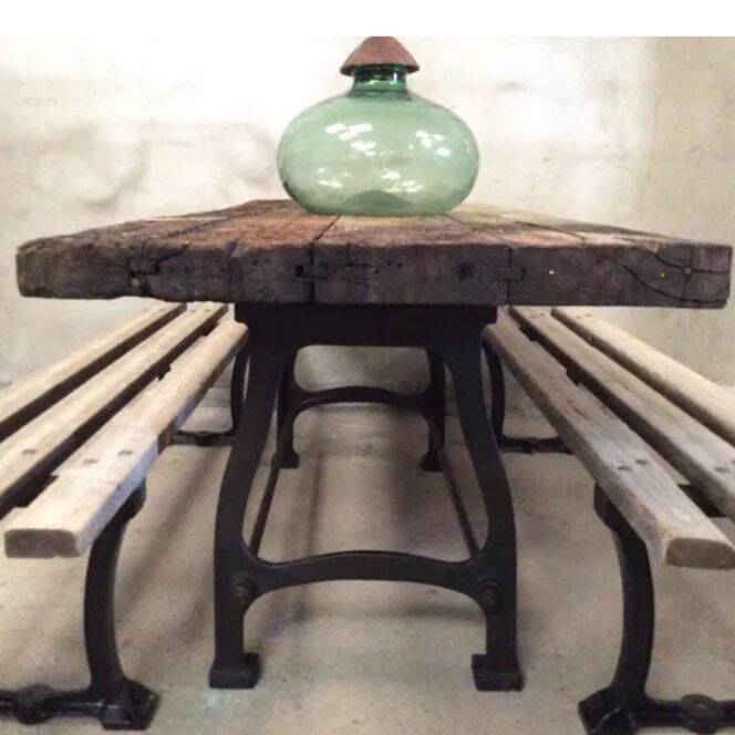 Industrial dining table with cast iron base
