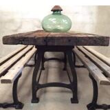 Industrial dining table with cast iron base