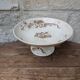 Flat serving compote dish in Terre de Fer HB & Cie with brown floral decoration.