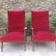 Paire de fauteuils vintage pieds compas en hêtre et velours.