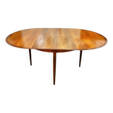 Extendable teak dining table