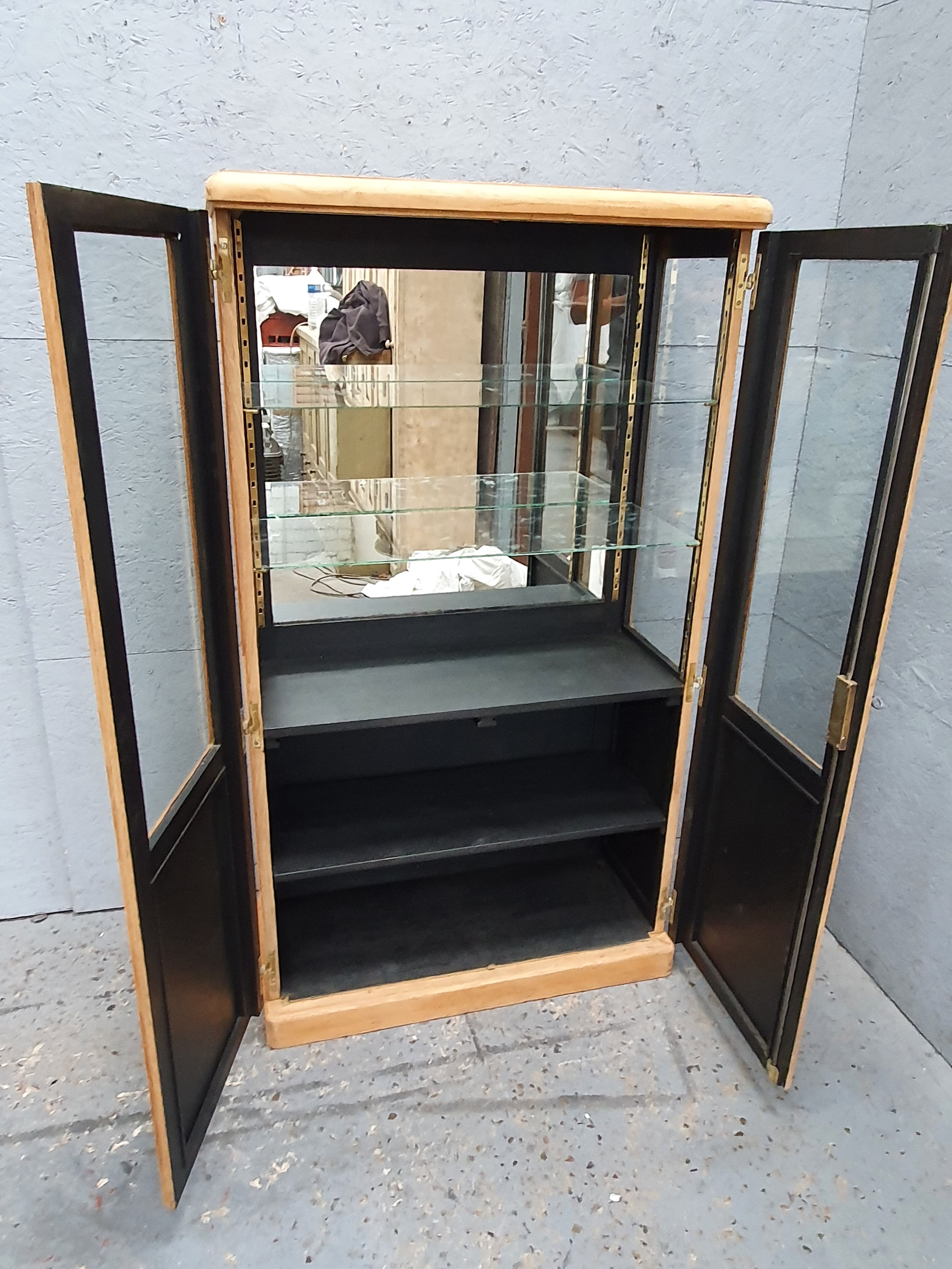 Vintage trend-going two-door raw oak window