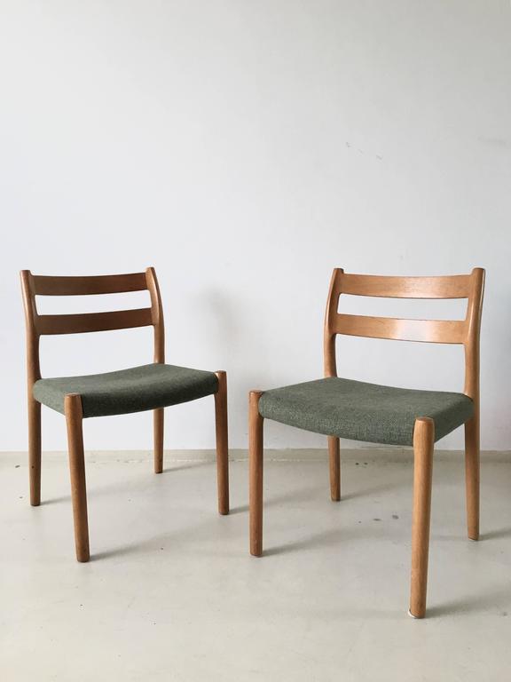 Pair of chairs by JL Moller for Hojbjerg Denmark 1960s teak