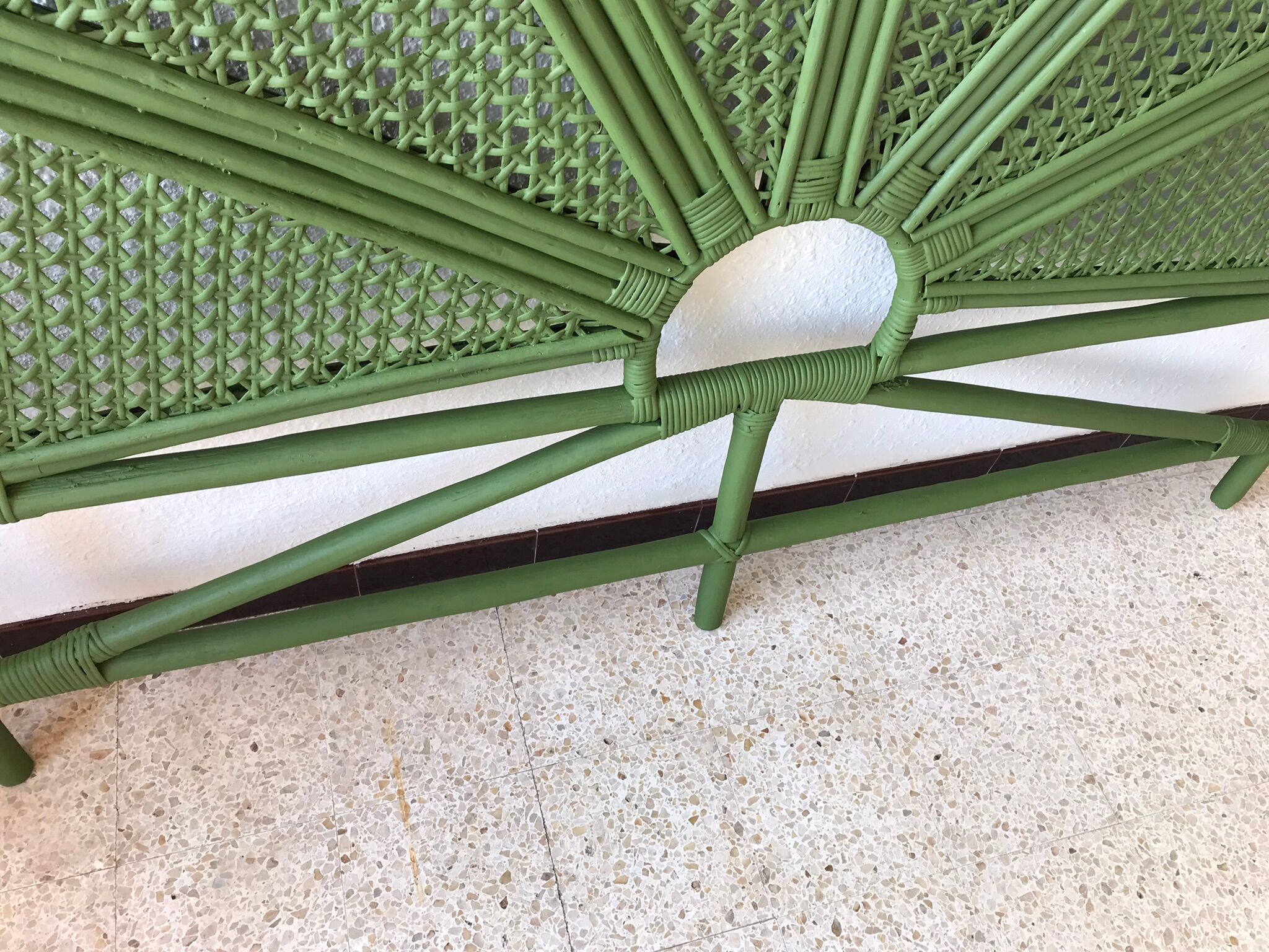 Double headboard in green rattan