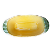 Oval and hollow earthenware slip dish