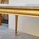 Table basse style Louis XVI en marbre et bois doré
