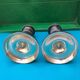 Pair of Louis XVI style candlesticks in silvered bronze