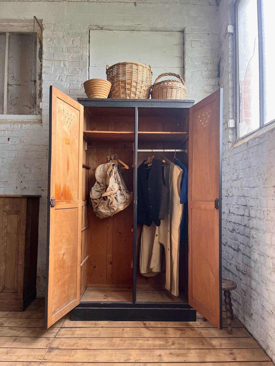 Old wooden locker with black patina