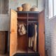 Old wooden locker with black patina