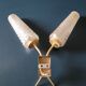 Golden metal wall light with 2 branches