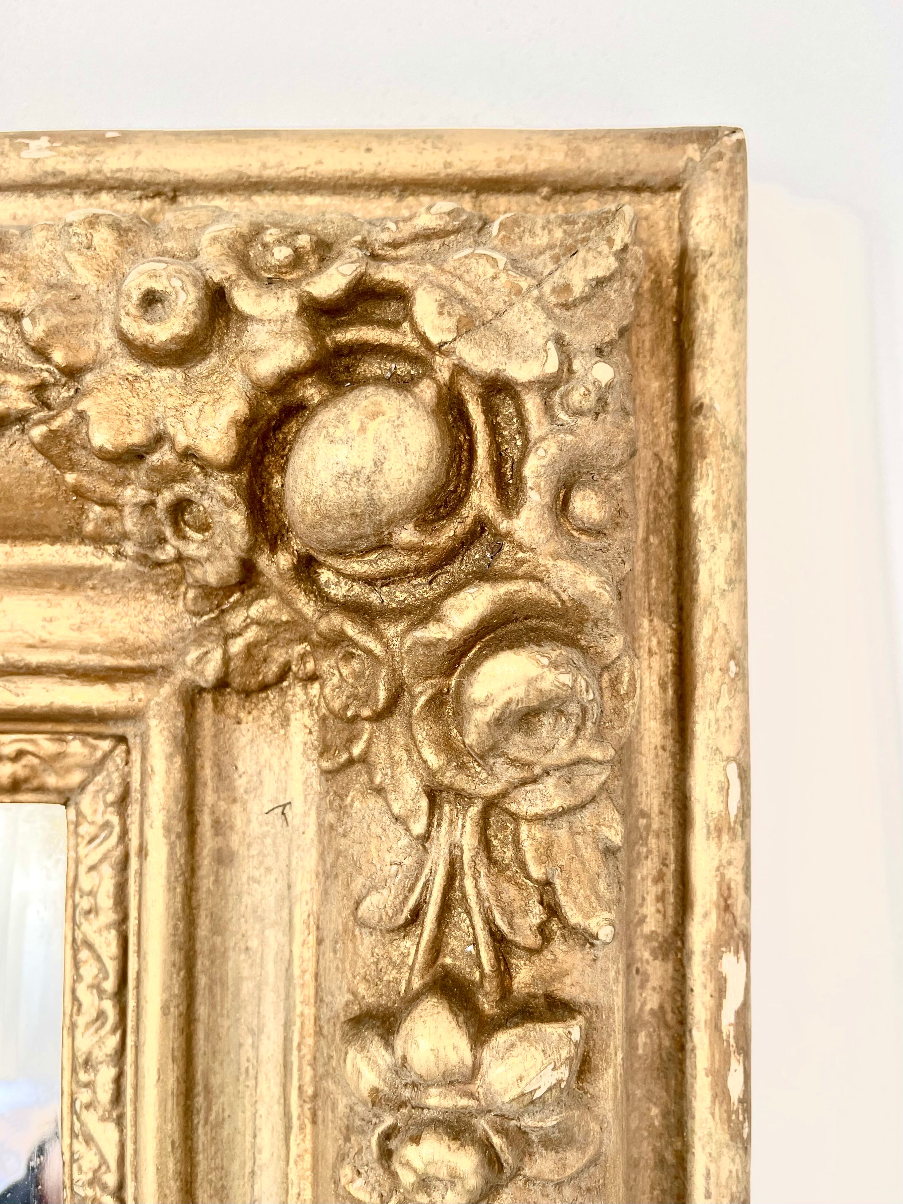 Antique gilded wooden mirror