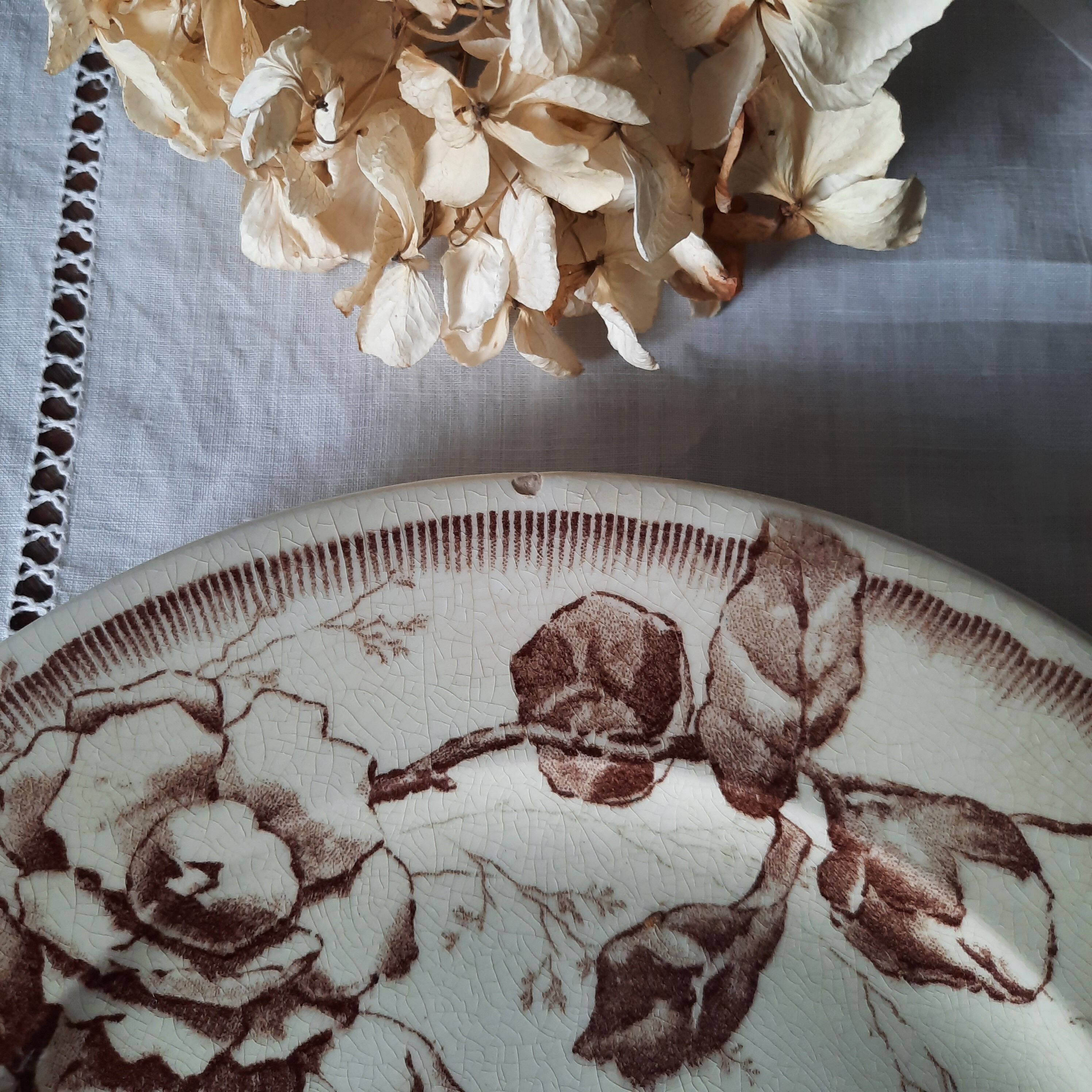 Old flat plates mismatched in earthenware