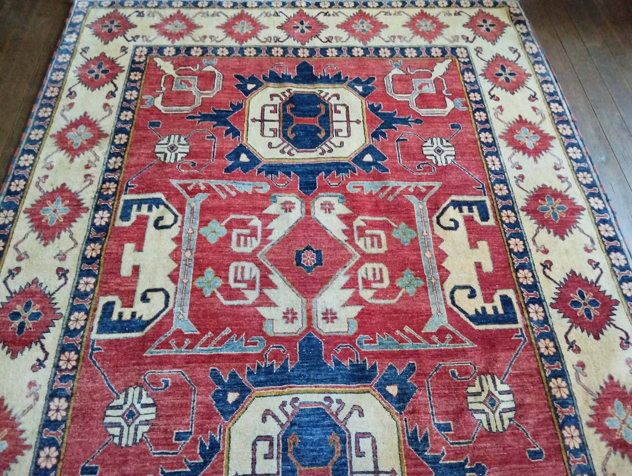 Handmade Pakistani Kazak rug 303x225cm