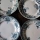 A set of 4 flat plates Terre de fer mismatched blue