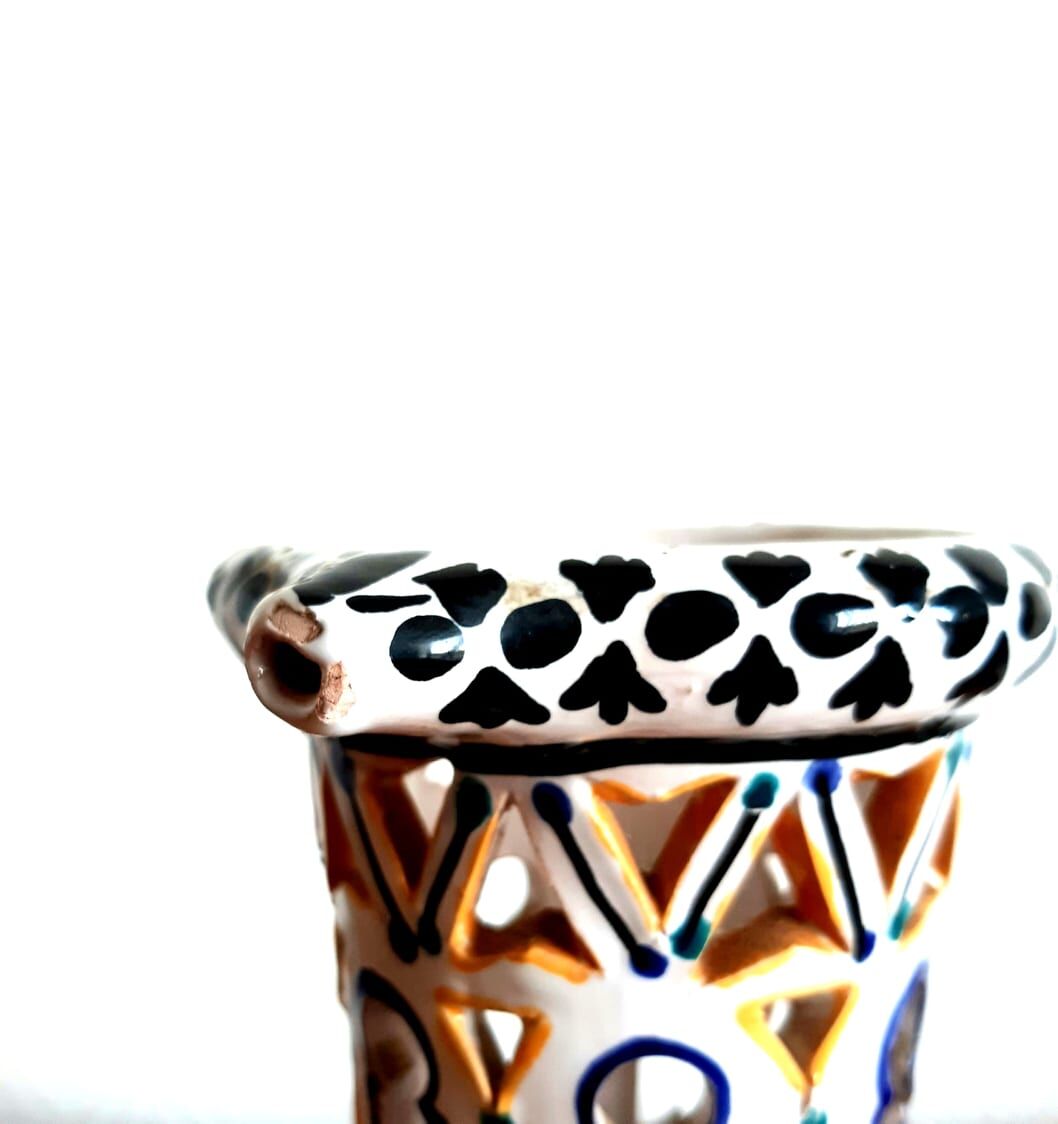 Deceptive pitcher in glazed earthenware