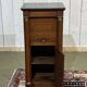 Empire bedside table from the 19th century in cherry wood and black marble.