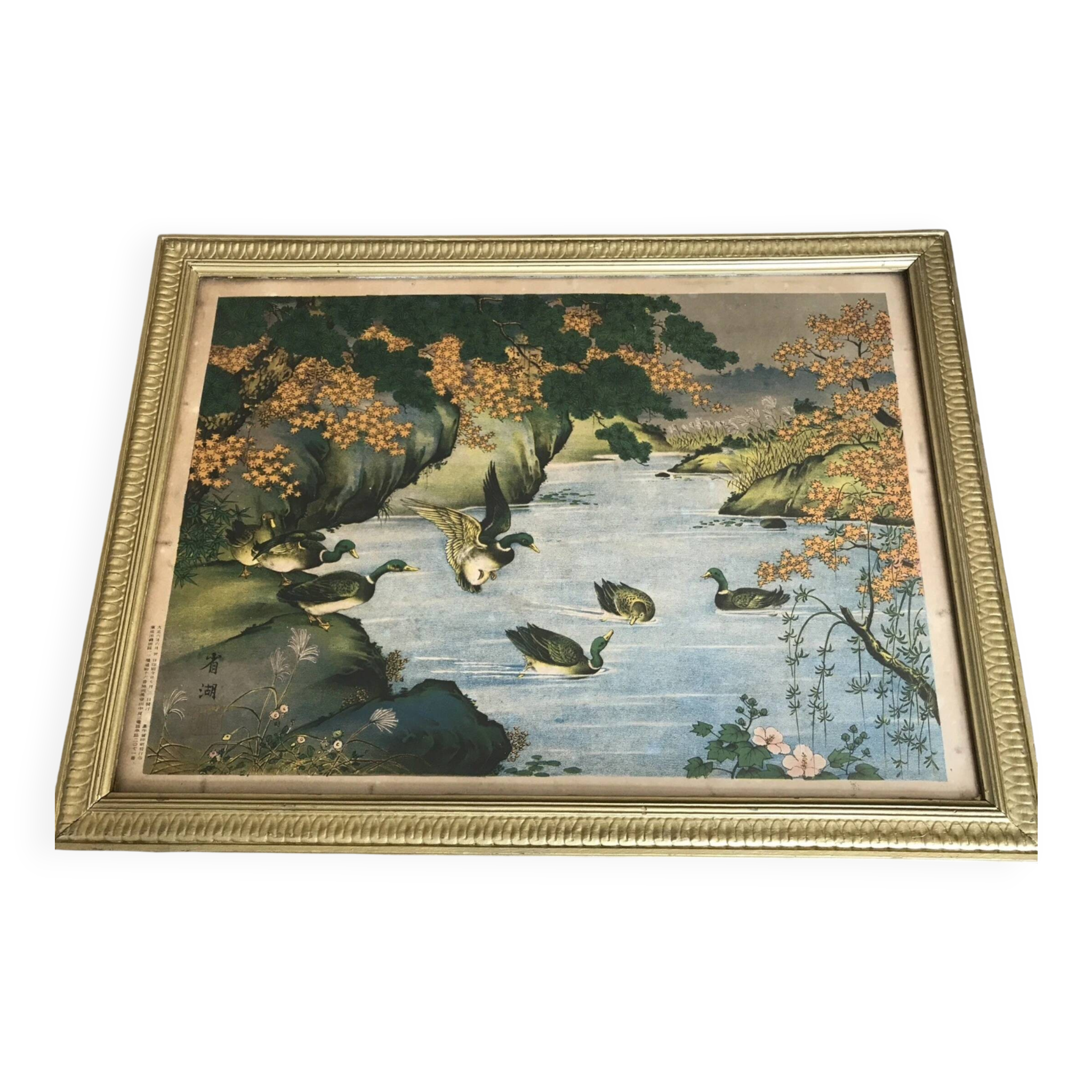 Old painting with a polychrome print decoration of ducks in nature.
