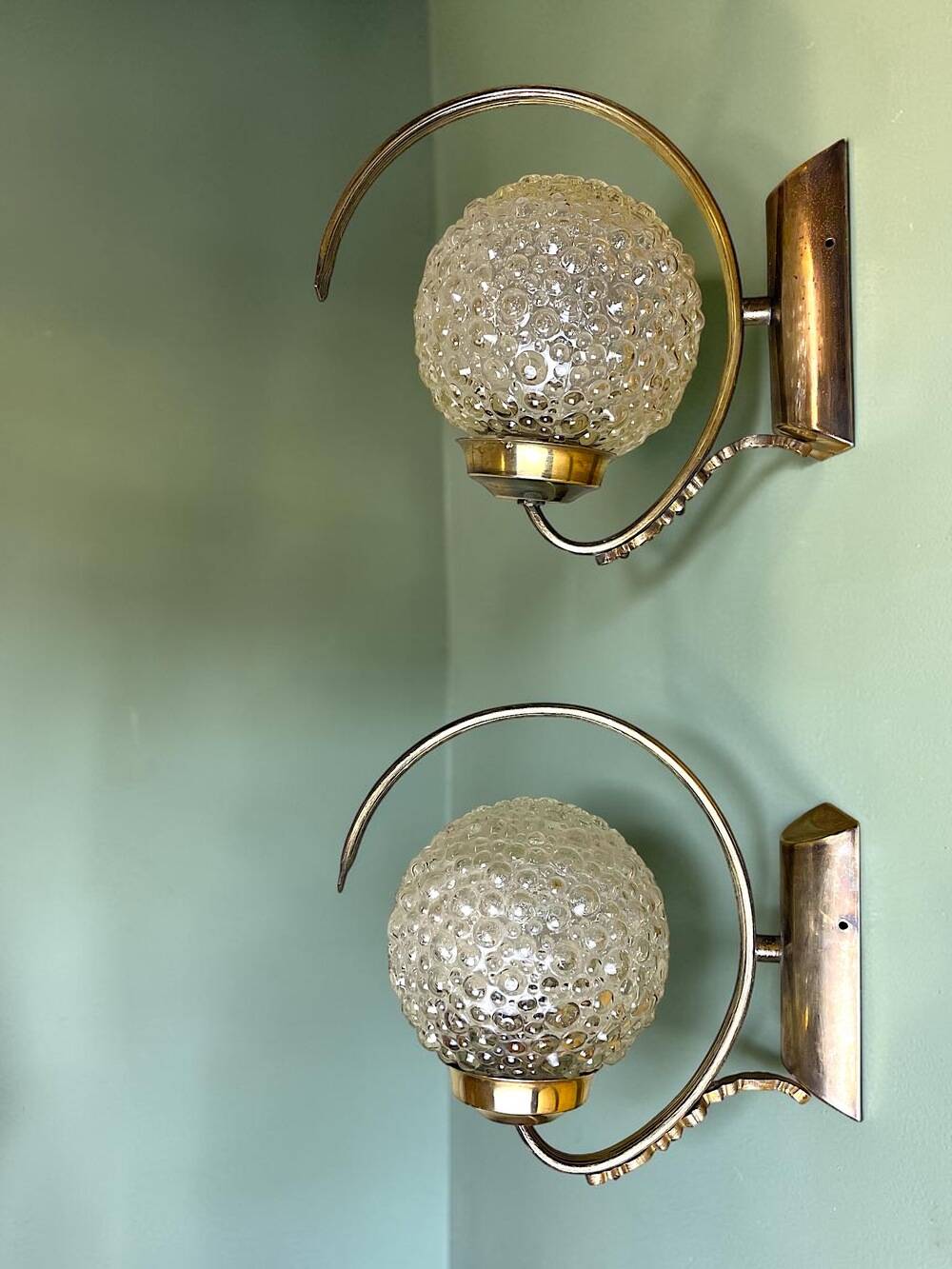Pair of 1970s brass and glass wall sconces