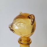 Zoomorphic carafe in amber glass