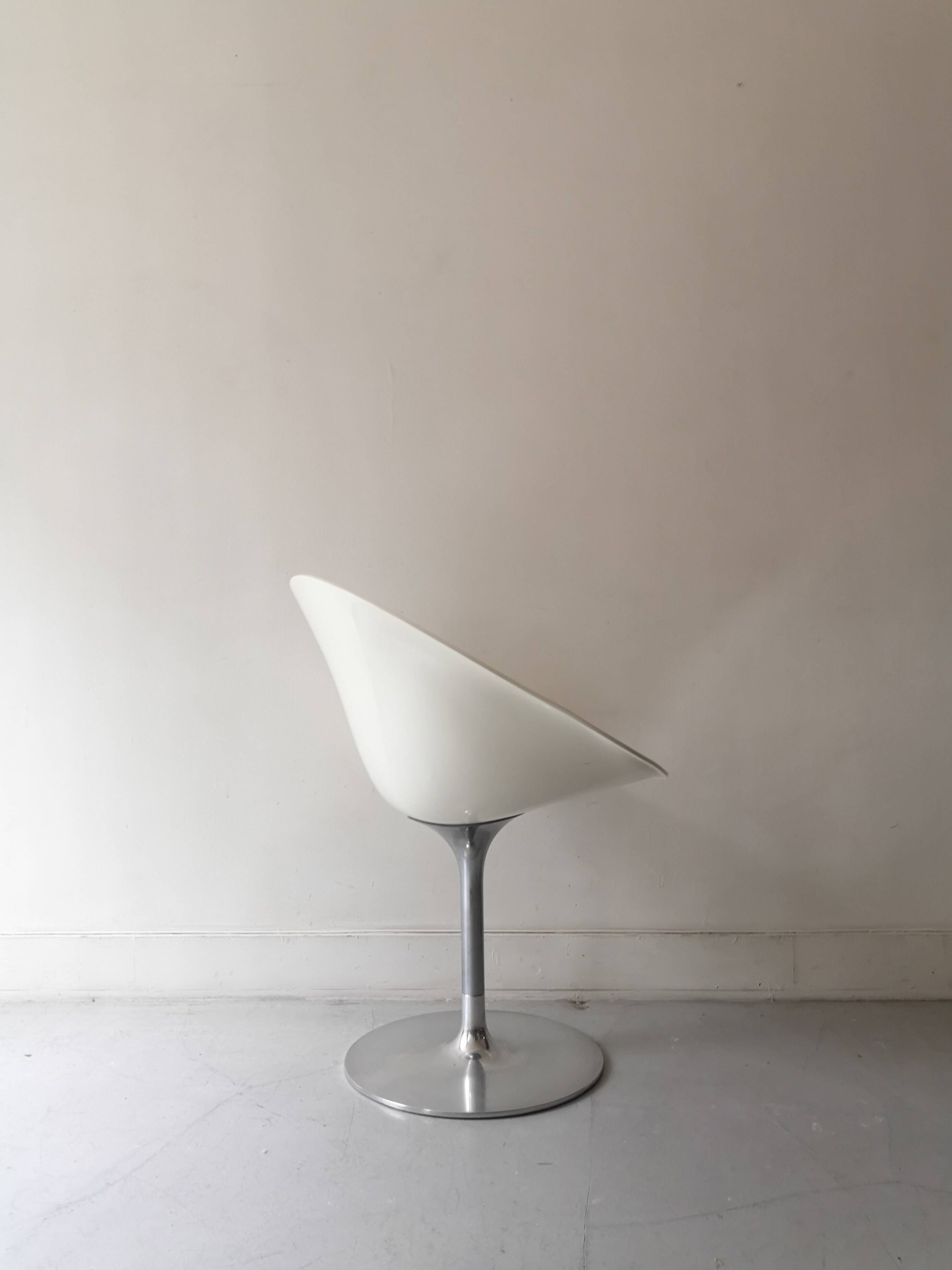 Ero swivel armchair in metal and white shell, p. starck design for kartell
