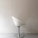 Ero swivel armchair in metal and white shell, p. starck design for kartell