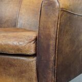 Charming 2-seater designer sofa made of sheep leather with a rustic look